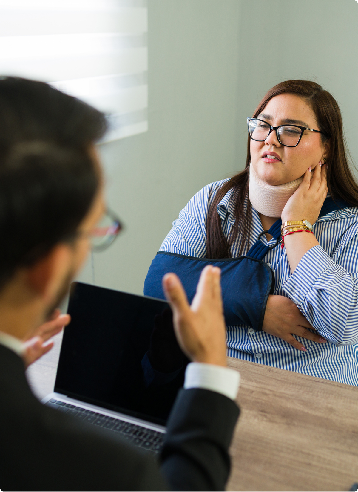Woman with neck brace in discussion