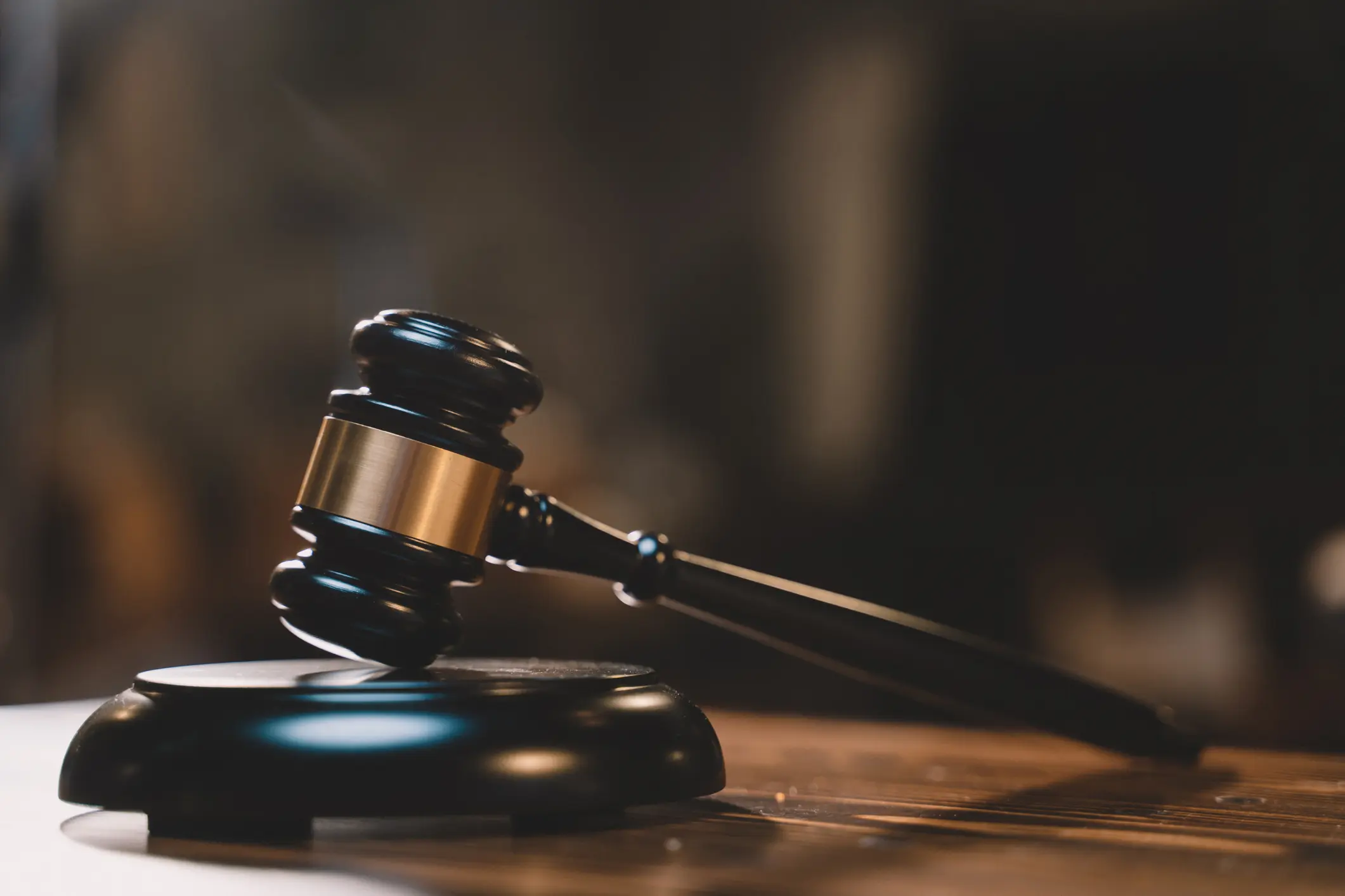 Judge's gavel in courtroom setting