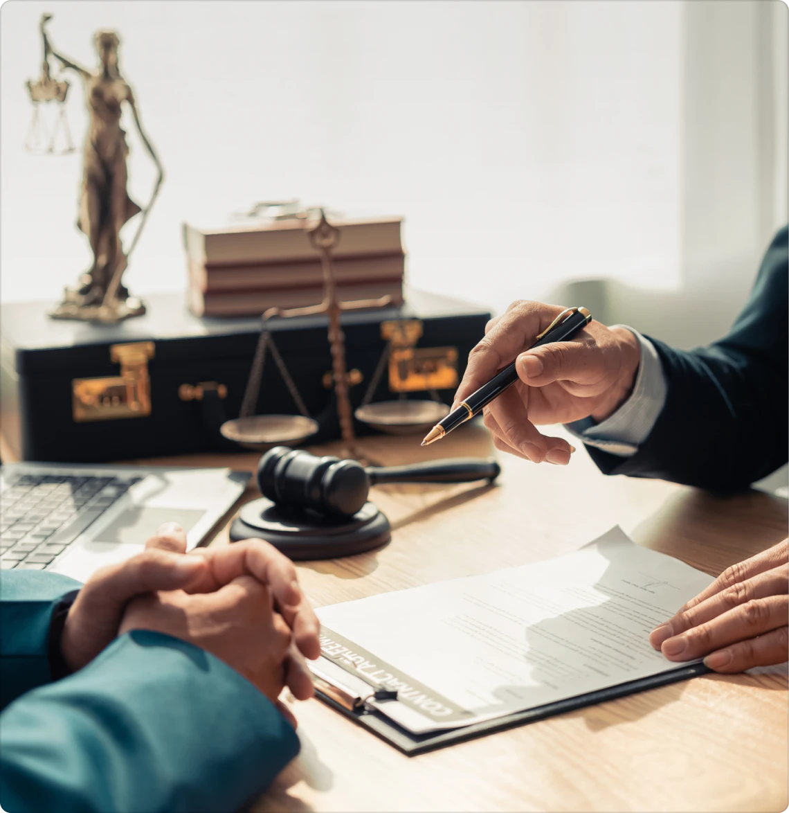 Legal discussion with documents and gavel